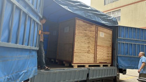 Latest company news about 2 set customized PCL gloves folding packing machine are dispatching to clients